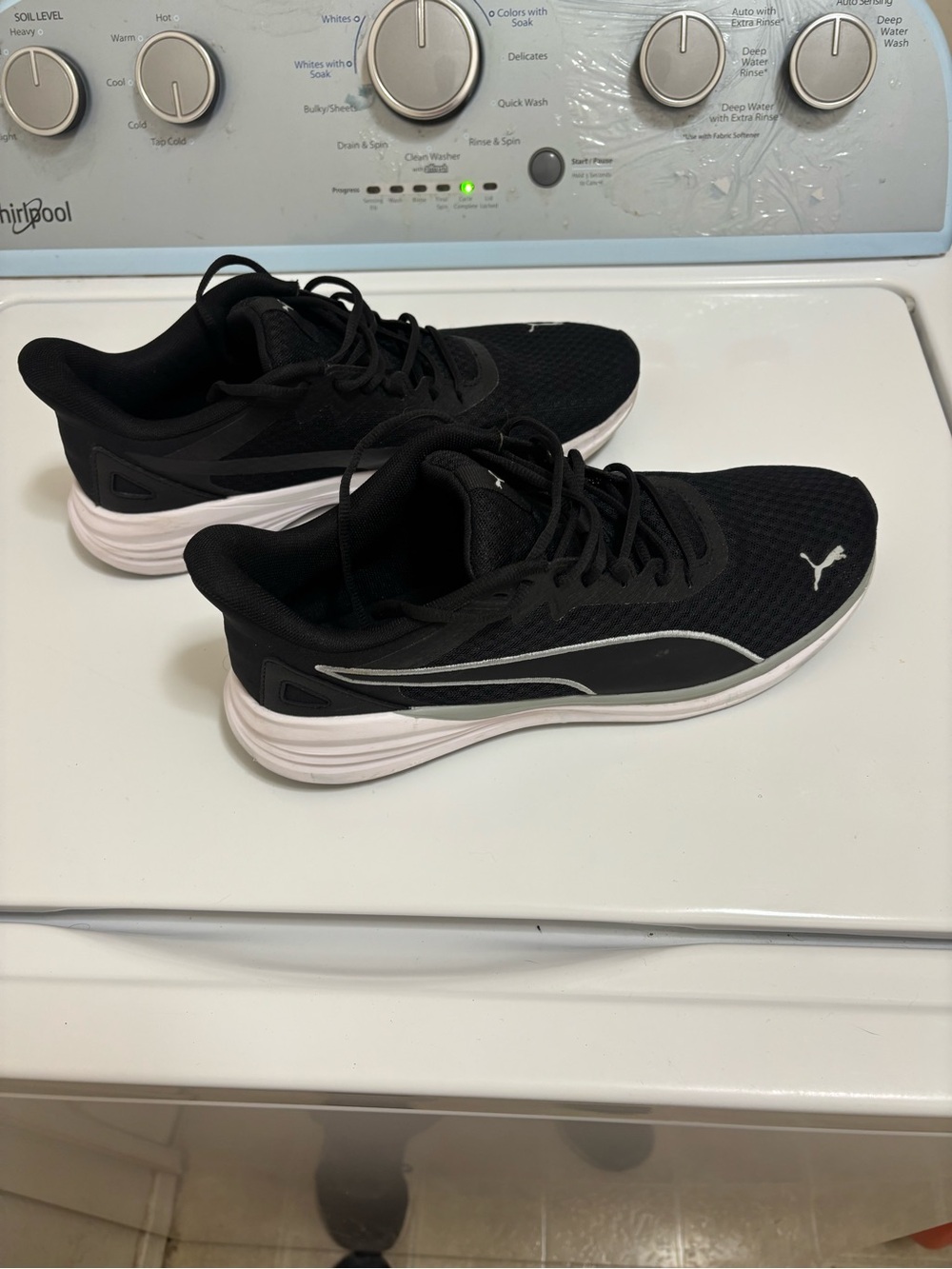 Puma Black Athletic Sneakers with White Sole and Silver Accent